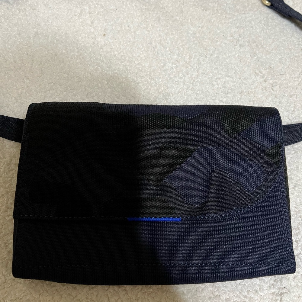 Rothy’s Belt Bag. Navy and black. Camo print on front flap